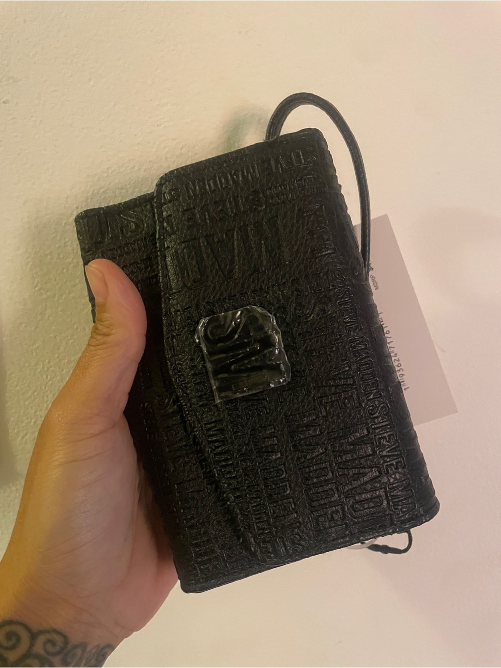 Steve Madden Black Embossed Logo Wristlet